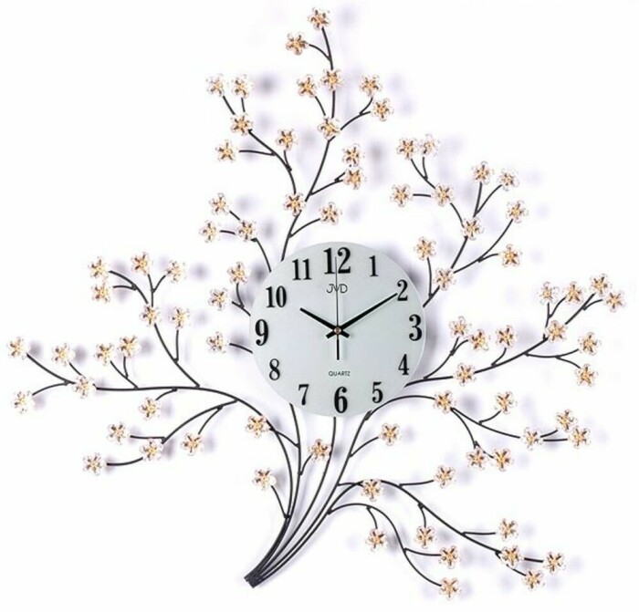 Horloge murale branche fleurie en métal et verre