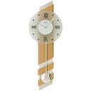 Horloge murale à balancier façon alu