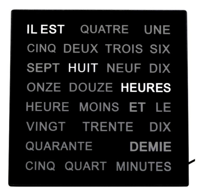 Horloge murale moderne à mots lumineux