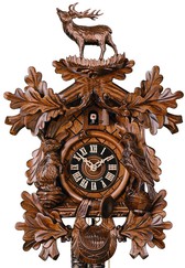 Horloge coucou mécanique traditionnel 1 jour cerf thème chasse gros plan