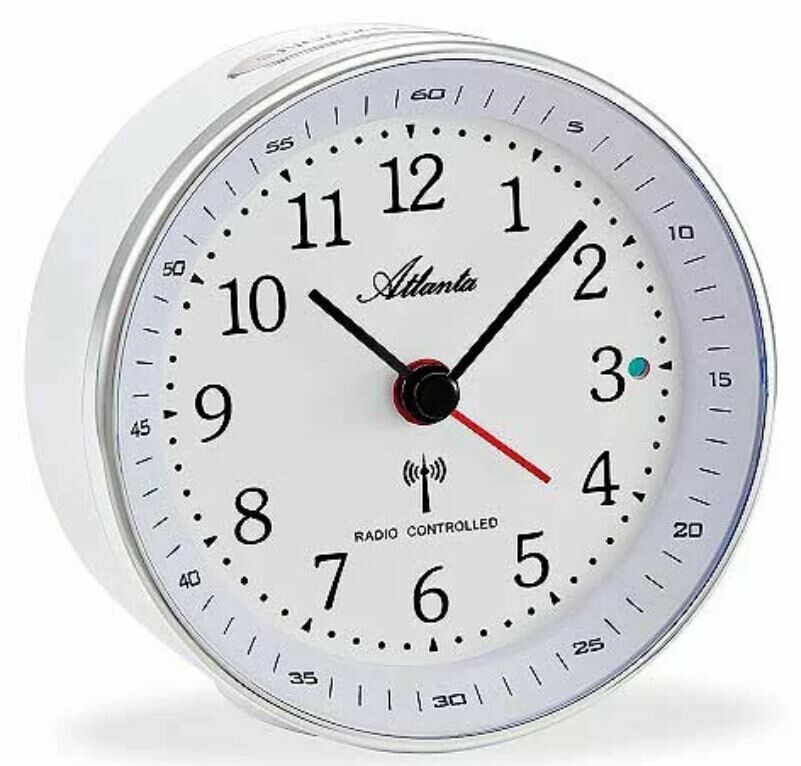 R&eacute;veil rond blanc radio-pilot&eacute; et silencieux