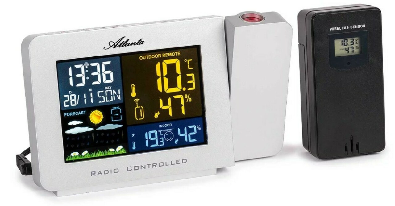 R&eacute;veil de voyage digital blanc radio-pilot&eacute; avec projection de l'heure
