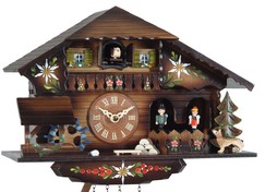 Horloge coucou à mélodie chalet en bois fleuri gros plan