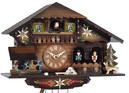 Horloge coucou &agrave; m&eacute;lodie chalet en bois fleuri gros plan