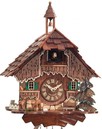 Horloge coucou musical chalet traditionnel gros plan