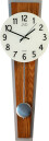 Horloge murale &agrave; balancier v&eacute; invers&eacute; en bois noyer
