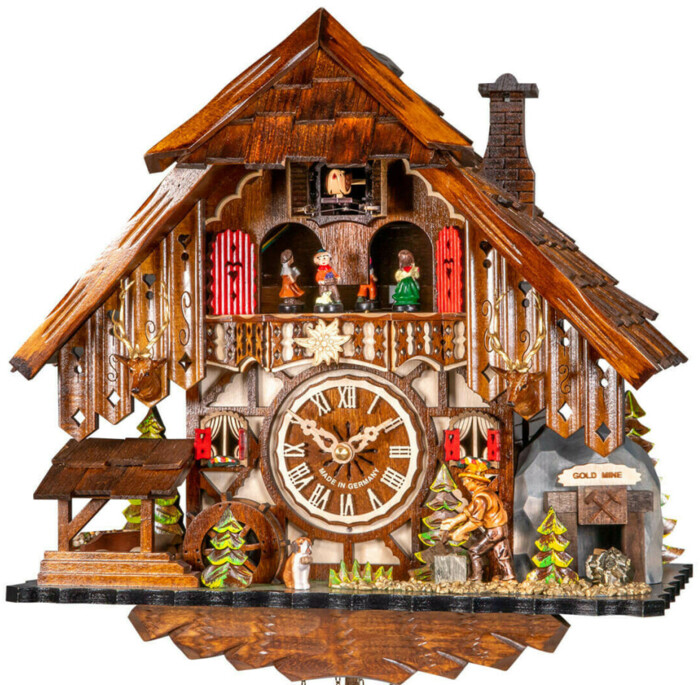 Horloge coucou chalet thème de la Foret Noire avec bucheron et mine d'or