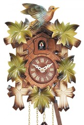 Horloge coucou à piles feuilles vertes oiseau couleur gros plan