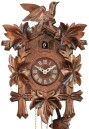 Horloge coucou en bois musical oiseau et feuilles gros plan