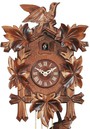 Horloge coucou m&eacute;canique traditionnel 8 jours envol oiseau gros plan