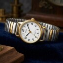 Montre &agrave; quartz ronde dor&eacute;e et argent&eacute;e pour dame_details