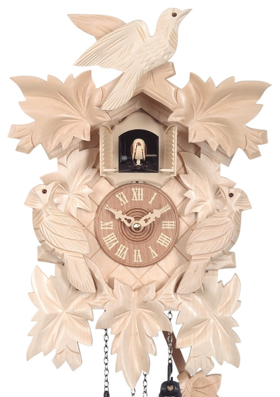 Horloge coucou en bois couleur naturelle feuilles et oiseau gros plan