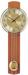 Horloge murale à balancier en merisier