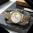 Montre pour dame en acier argent&eacute; et dor&eacute; avec date boucle d&eacute;ployante cadran blanc_details