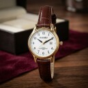 Montre pour femme boitier dor&eacute; bracelet bordeaux avec date_details