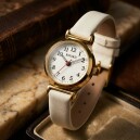 Montre pour femme boitier rond dor&eacute; bracelet cr&egrave;me_details