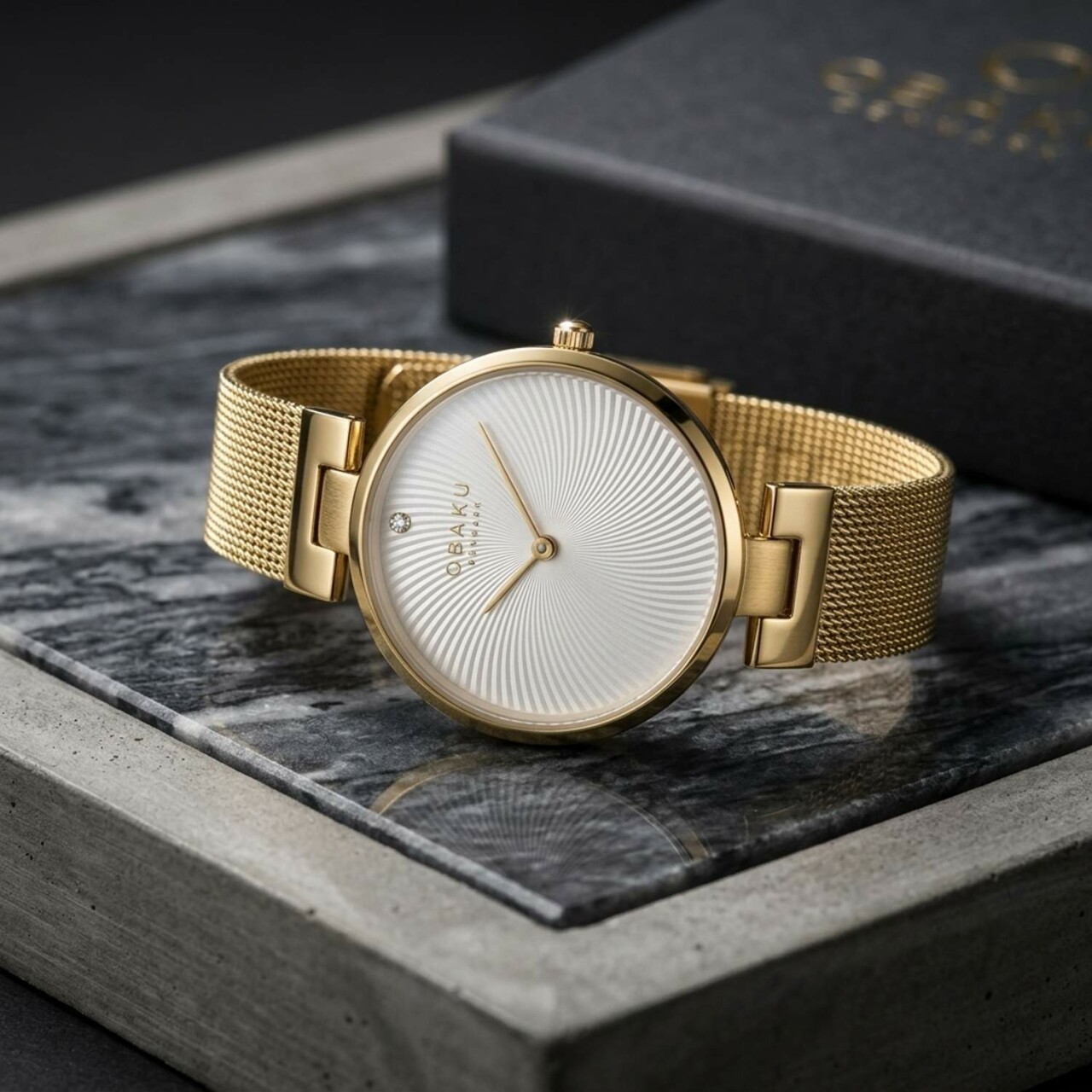 Montre OBAKU Diamant ronde en acier argent&eacute; cadran blanc