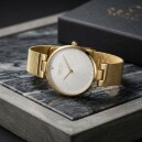 Montre OBAKU Diamant ronde en acier argent&eacute; cadran blanc