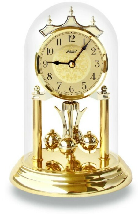 Pendule 400 jours en métal doré 23 cm cadran doré fleurs dorées