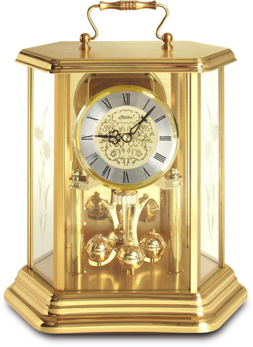 Pendule 400 jours à sonnerie cage hexagonale de verre métal doré 26 cm