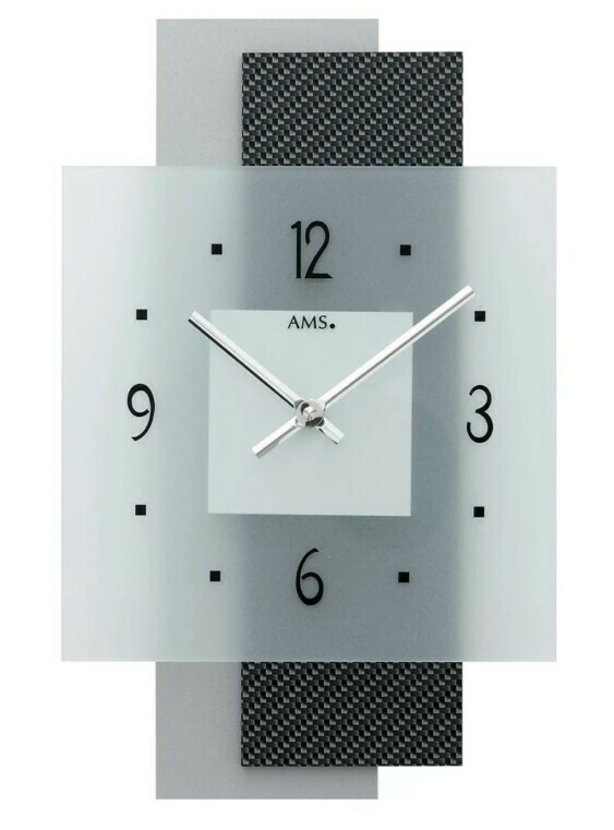 Horloge murale moderne en placage effet titane