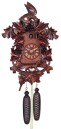 Horloge coucou &agrave; piles traditionnelle grappes de raisin gros plan
