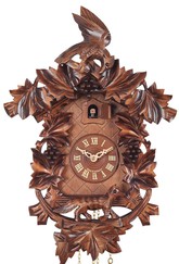 Horloge coucou à piles traditionnelle grappes de raisin gros plan