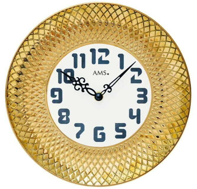 Horloge murale en céramique dorée