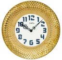 Horloge murale en c&eacute;ramique dor&eacute;e