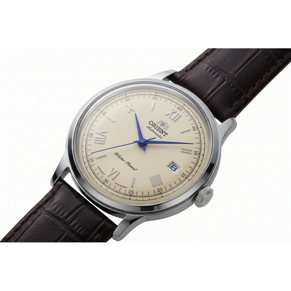 Montre automatique Orient Bambino cadran ivoire homme AC00009N pos&eacute;e