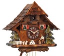 Horloge coucou m&eacute;canique traditionnel chalet 1 jour bucheron gros plan
