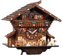 Horloge coucou m&eacute;canique traditionnel chalet 8 jours gros plan