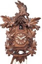 Horloge coucou en bois oiseau grappes de raisin gros plan