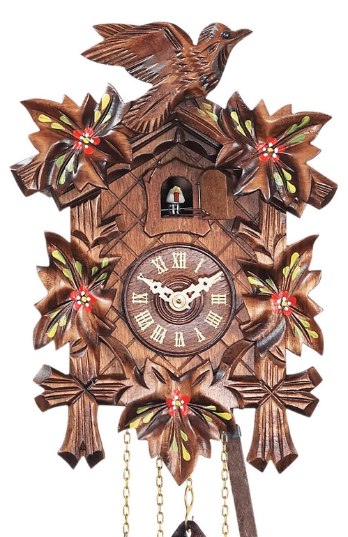 Horloge coucou &agrave; piles feuilles rouges gros plan