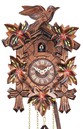 Horloge coucou &agrave; piles feuilles rouges gros plan