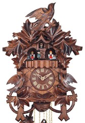 Horloge coucou musical à piles danseurs gros plan