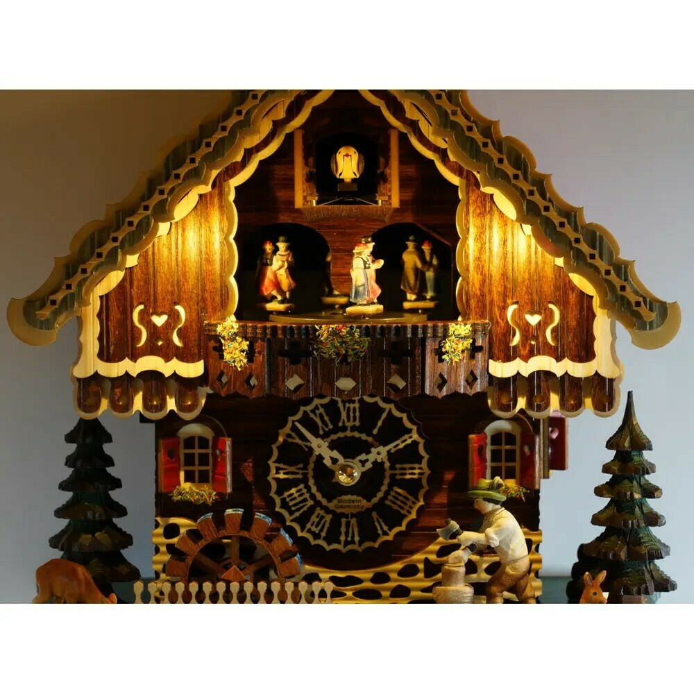 Horloge coucou chalet 12 m&eacute;lodies Trenkle avec &eacute;clairage d&eacute;taill&eacute;