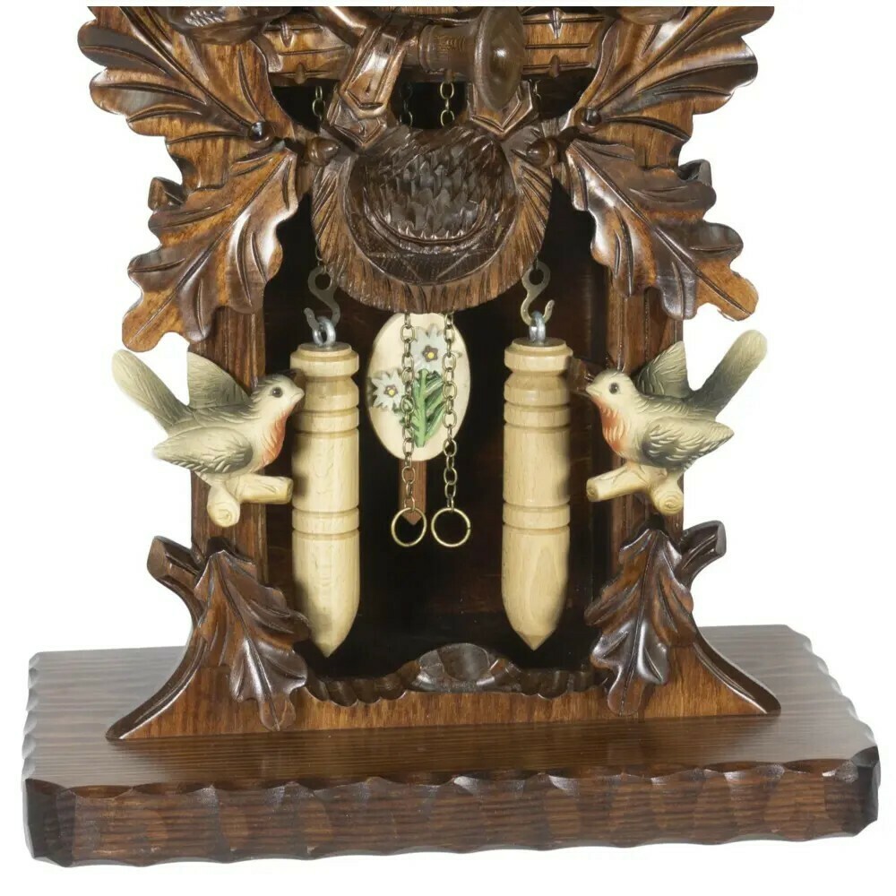 Horloge coucou traditionnelle Trenkle style chasseur For&ecirc;t-Noire d&eacute;tail bas