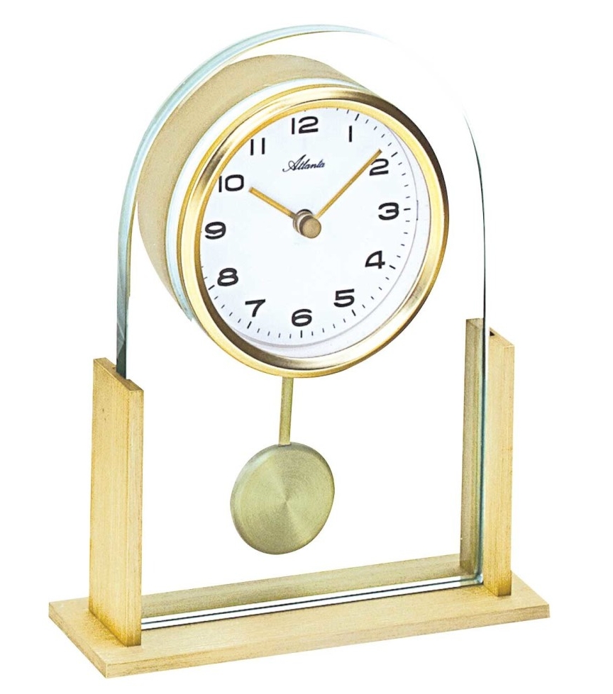 Pendule à poser en verre et laiton balancier apparent