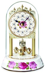 Pendule 400 jours à quartz fleurs roses socle en porcelaine