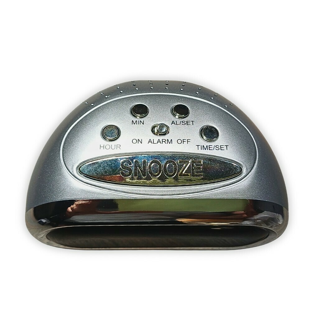 R&eacute;veil matin digital gris sur secteur affichage vert dessus