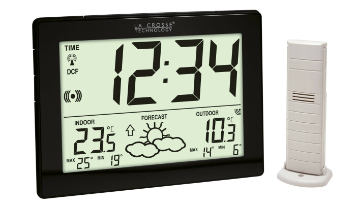 Station météo radio pilotée noire STX avec thermomètre, réveil et