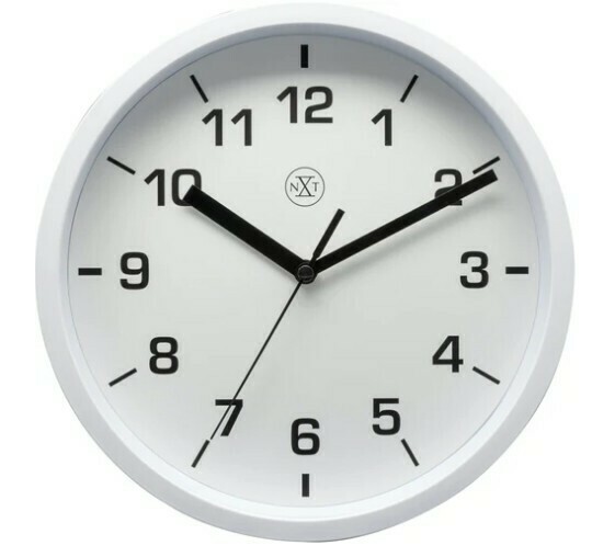 Pendule murale ronde blanche et lisible cadran blanc